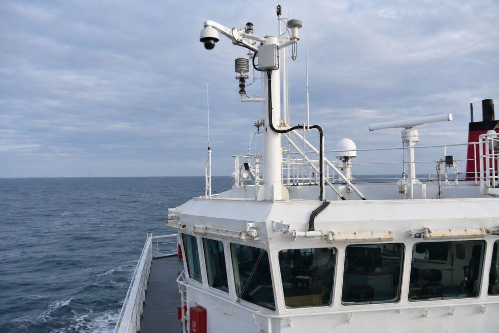Ship mast sensors and protected fiber route toward the bridge
